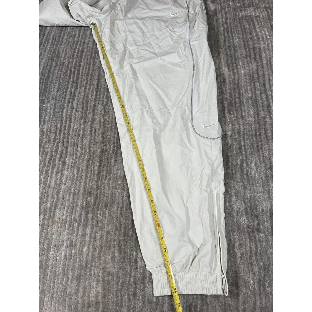 Nike Track Pants Mens Medium White Solo Swoosh Loose Fit Taper Leg Stacked New